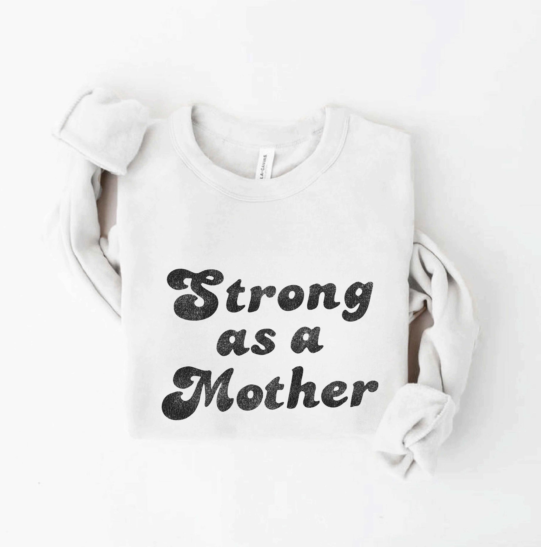 White baby onesie with 'Strong as a Mother' text on a white background